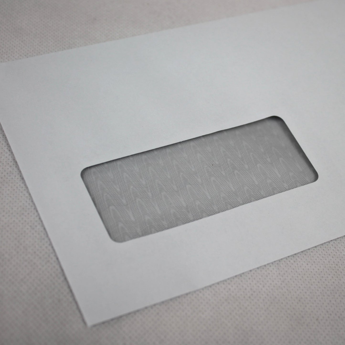 121x235mm DL+ White Gummed Envelopes (Window 35x90mm / 20mm left, 25mm up)